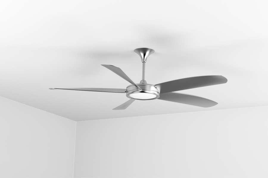 A standard silver ceiling fan with light kit.